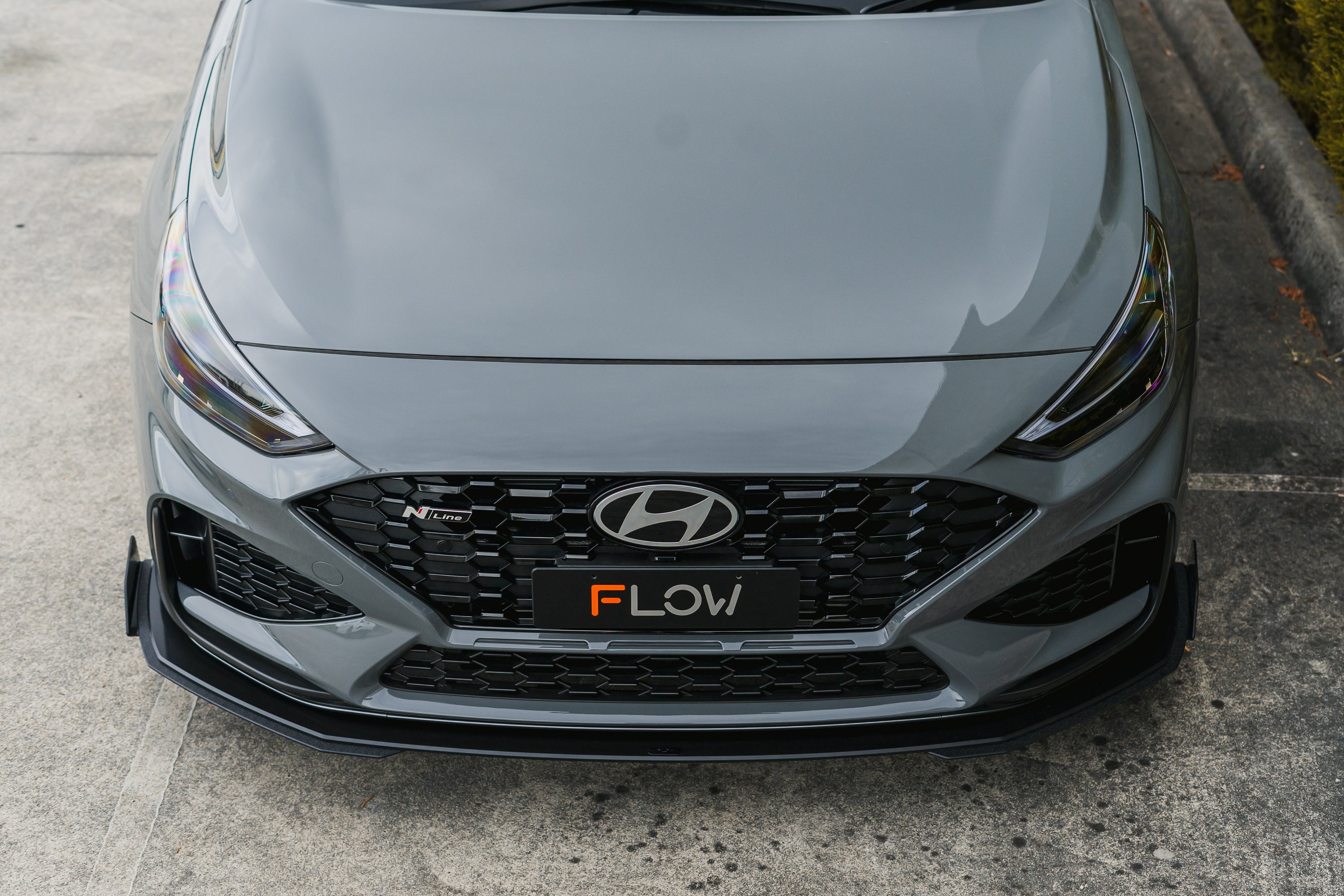 i30N-Line Hatch PDe.V6 FL 2024+ Front Lip Splitter Extensions (Pair)